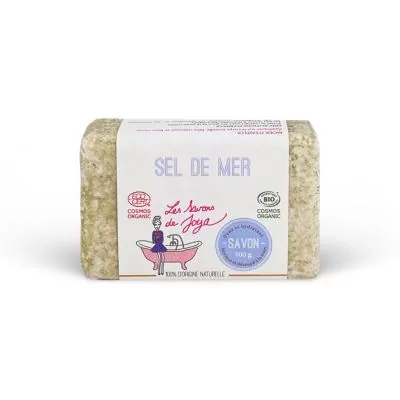 Savon SEL DE MER de Les Savons de Joya, certifié COSMOS ORGANIC et BIO. Le savon est de couleur crème avec des grains fins dispersés, suggérant une texture exfoliante. pesant 100g et est 100% d'origine naturelle.